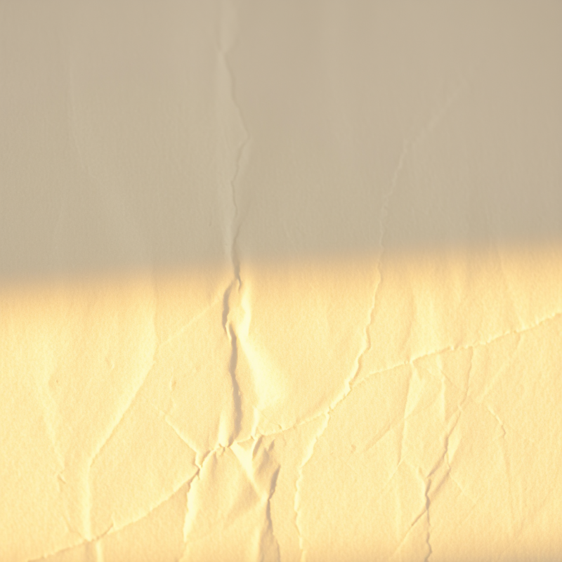 Crinkled Paper Texture with Warm Light