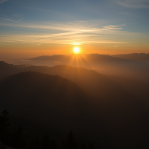 Misty Mountain Sunrise With Layers Of Peaks Golden Light