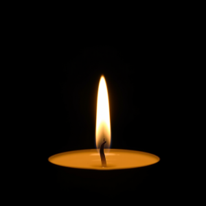 Single Candle Flame On Dark Background Peaceful
