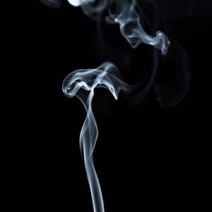 Smoke Tendrils Frozen In Time Against Pure Black Background