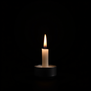 Single Candle Flame On Dark Background Peaceful