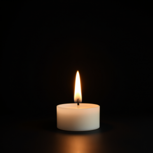 Single Candle Flame On Dark Background Peaceful